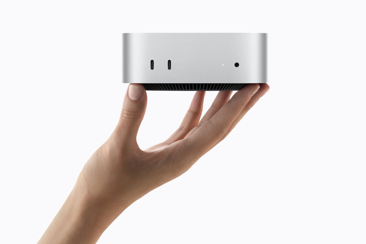 Mac mini (2026) Prateado na palma da mão